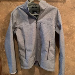 Mens Grey North face M. Waterproof! Small pen hole on the inside. Like new.